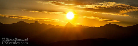 A gold and yellow sunrise looking to Matterhorn Peak near Ridgway, Colorado